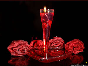 Rooi rose gemaak van materiaal wat 'n lang rooi kers in glas omring vir Valentynsdag-afspraakversiering. — 4:3 Muurpapier