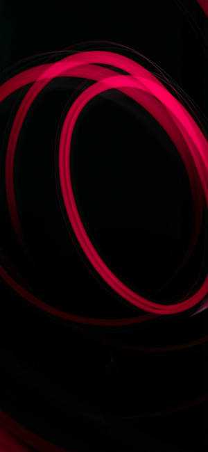 Rooi sirkels gloei muurpapier — iPhone 15 Muurpapier