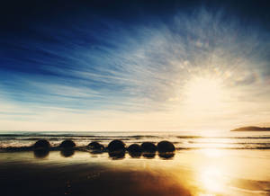 Moeraki Boulders-strand sonop-muurpapier