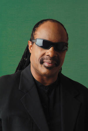 Stevie Wonder Groen Agtergrond — Xiaomi Pad 7S Pro 12.5 Muurpapier