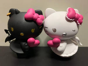 Swart en wit Hello Kitty Halloween muurpapier