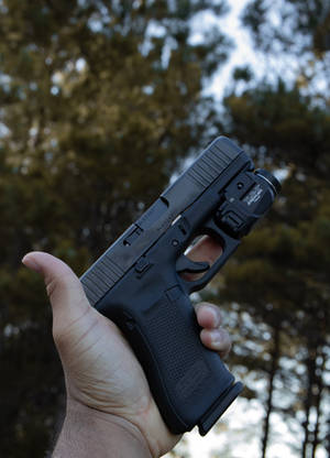 Hou 'n Glock met Flitslig Muurpapier — OnePlus Pad Muurpapier