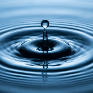 Hoëspoed waterrimpel agtergrond vir fisika liefhebbers. — Pixel Watch 3 Muurpapier