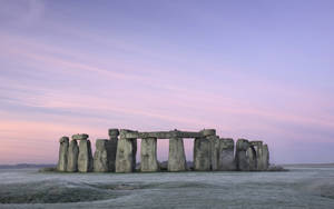Winter by Stonehenge Engeland-agtergrond — Dagbreek Muurpapier